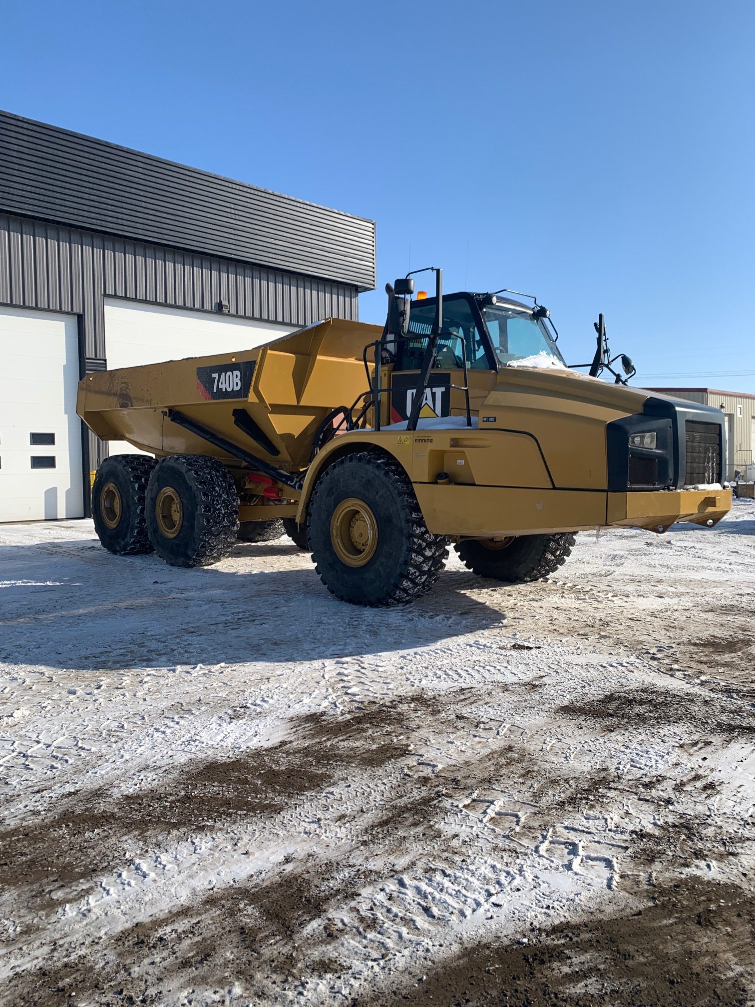 Caterpillar 740B Articulated Dump Truck Spectrum Equipment